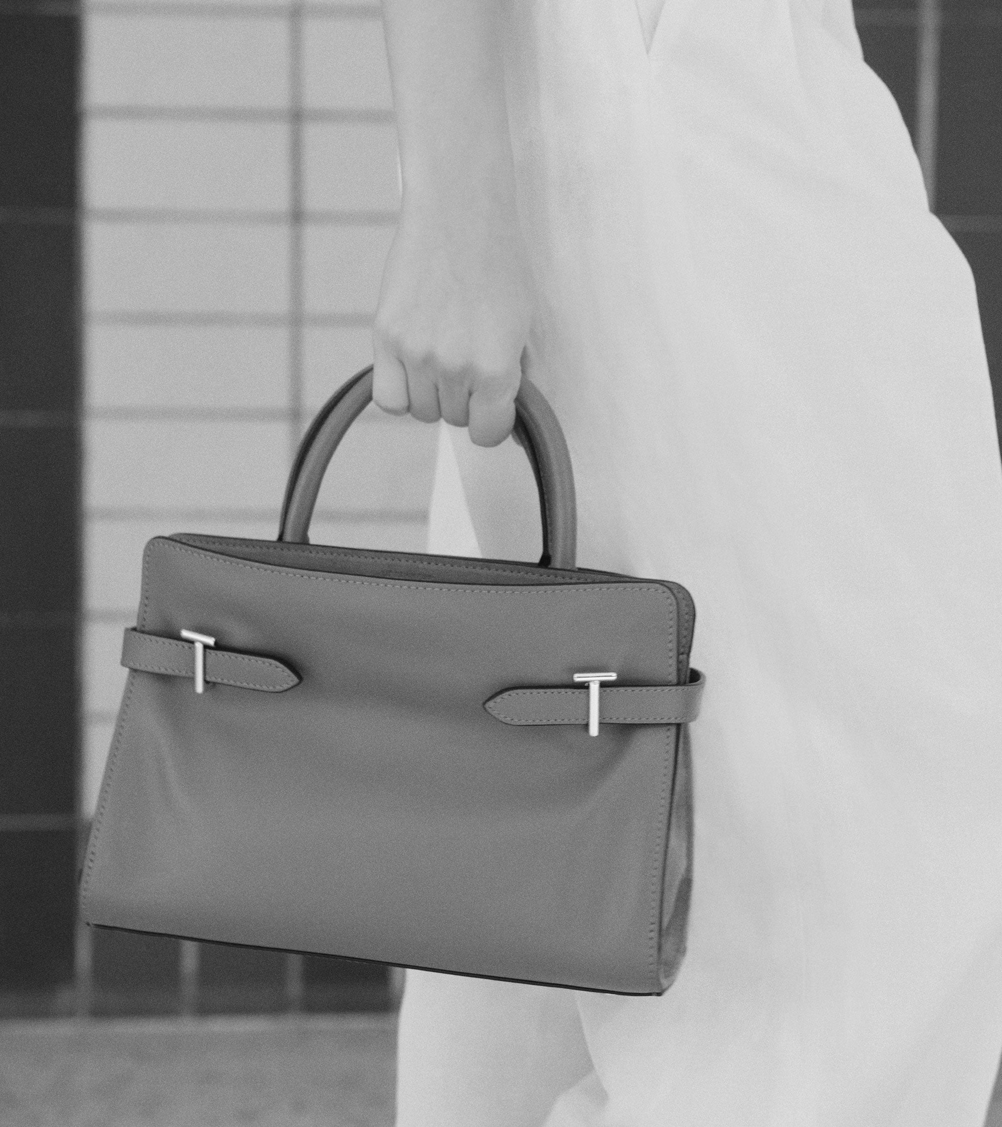 Mittelgroße Handtasche Emie aus Glatt- und Nubukleder