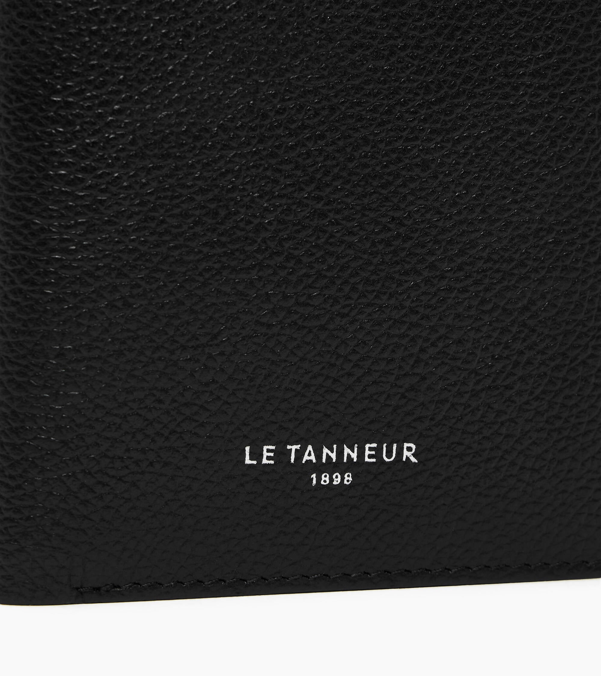 Lucien small vertical zipped wallet in grained leather